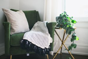Picture of a nice clean home with clean throw on top.